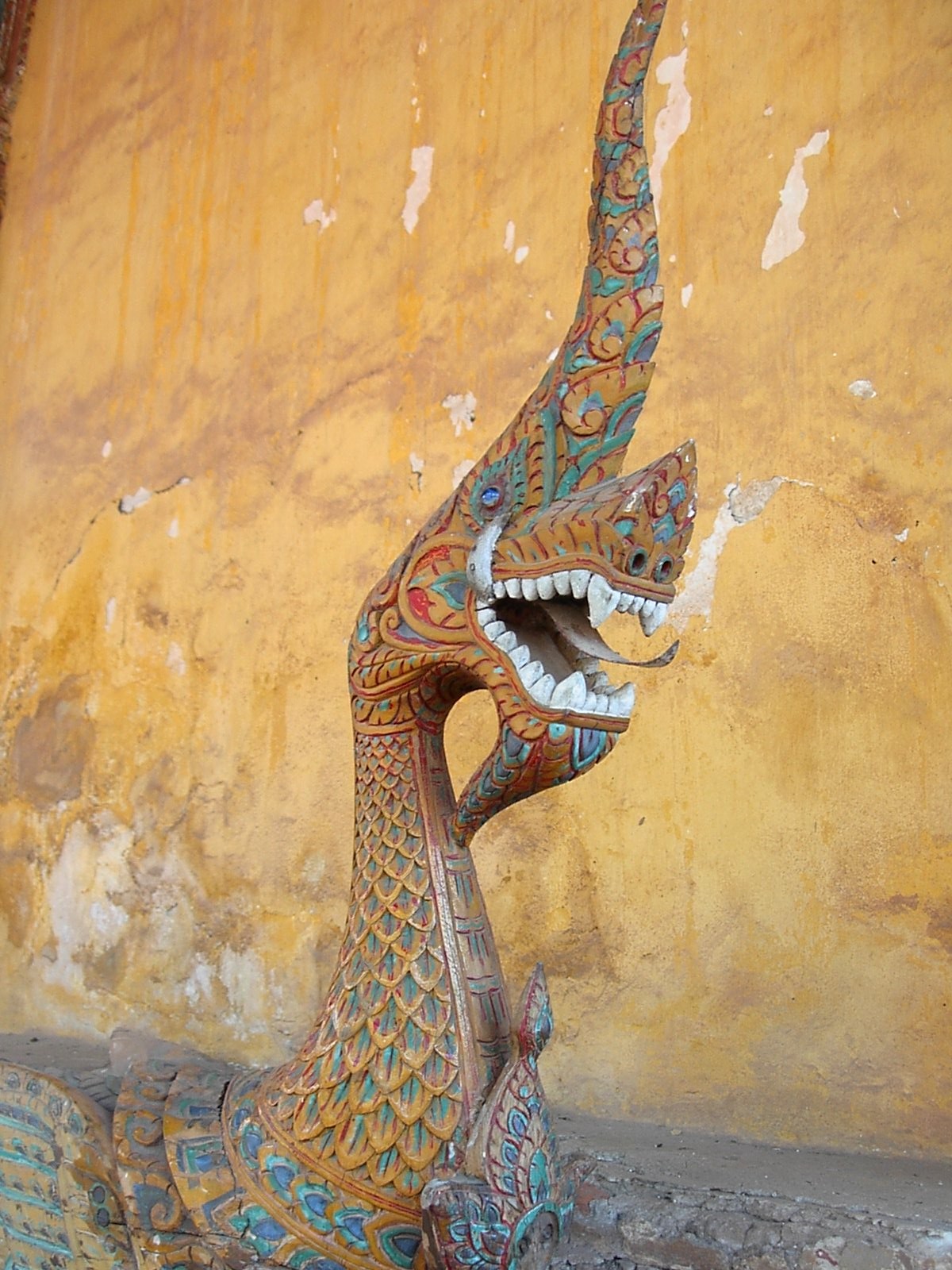 Naga pendant — A en:Phaya Naga guarding the Temple of en:Wat Si Saket, Vientiane, Laos.