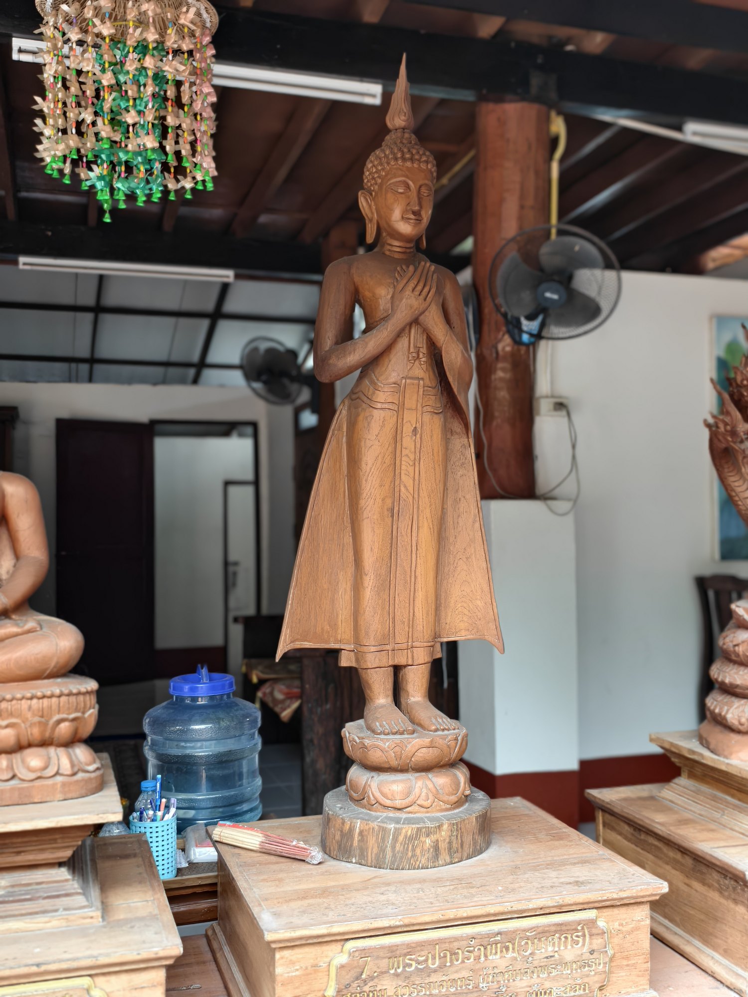 พระประจำวันศุกร์ ปางรำพึง · Buddha of the day: Standing, hands crossed on the chest — the Friday posture