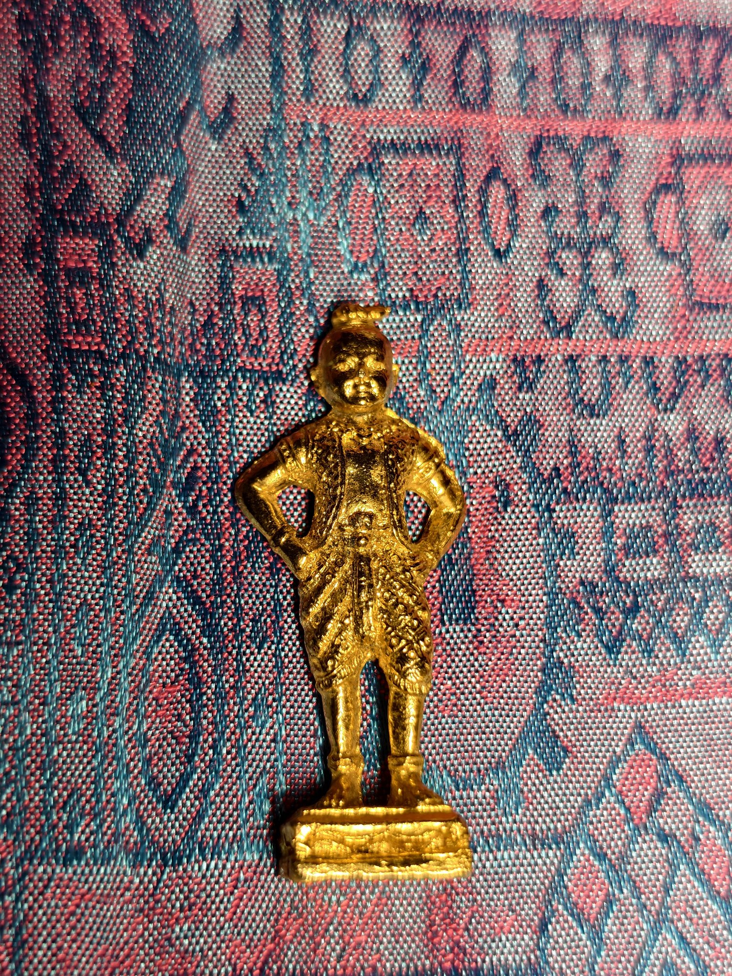 Standing gilt figure, fists on hips, photograph 3