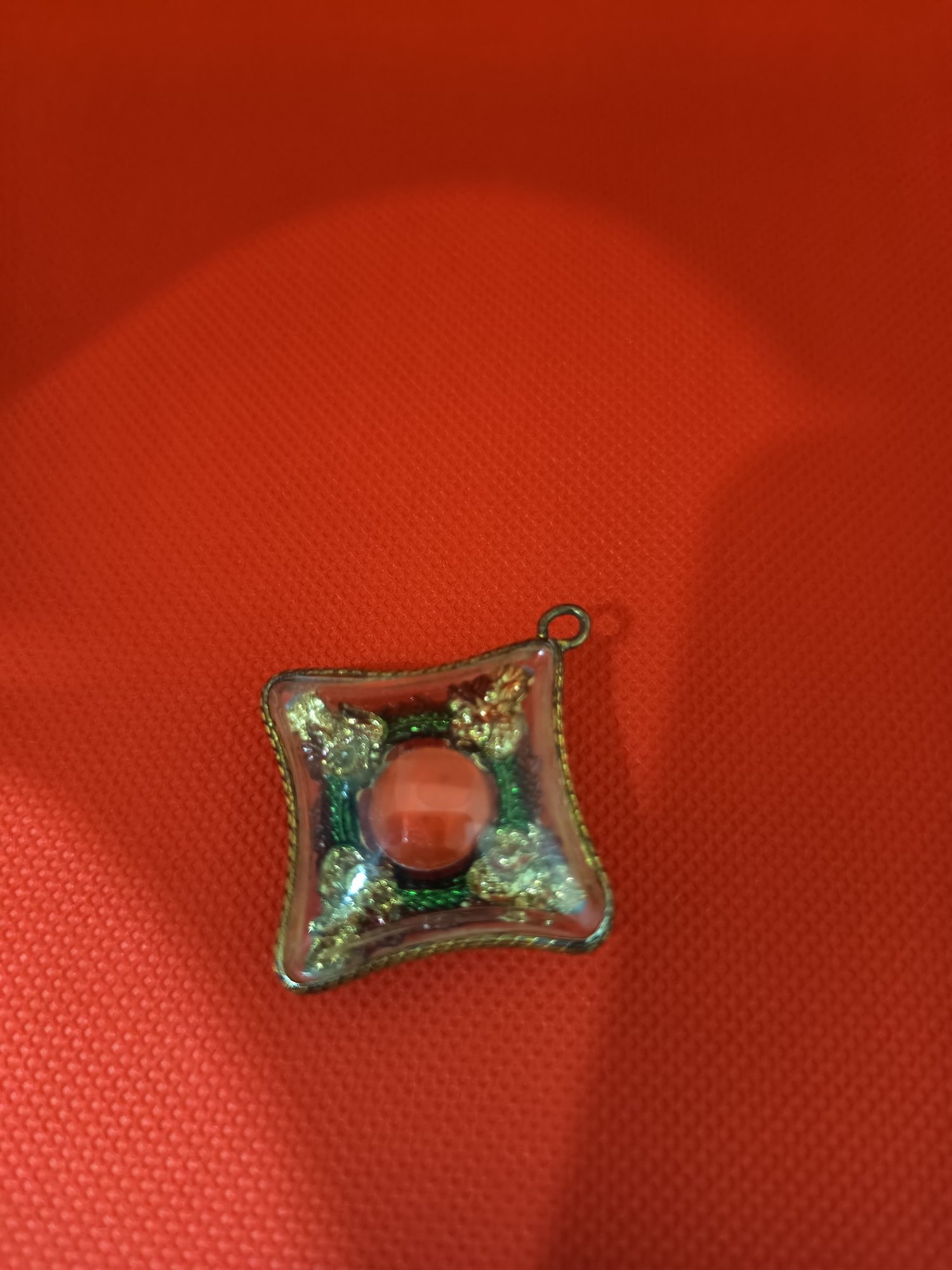 Four nagas eating each other, framing a red naga eye, photograph 1