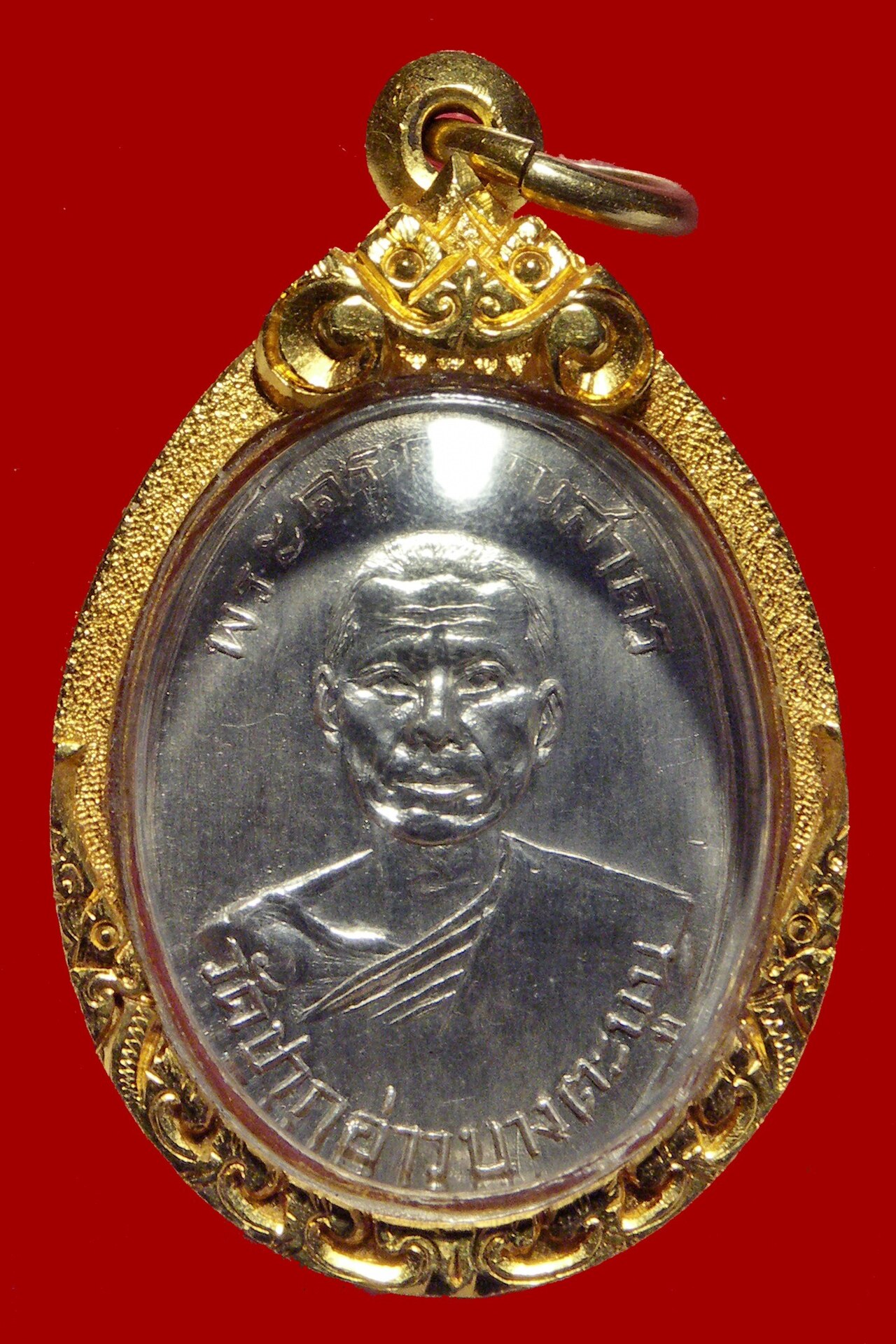 monk medallion — เหรียญหลวงพ่อแฉ่ง สำเภาเงิน รุ่น 1 พ.ศ.2494 ด้านหน้า