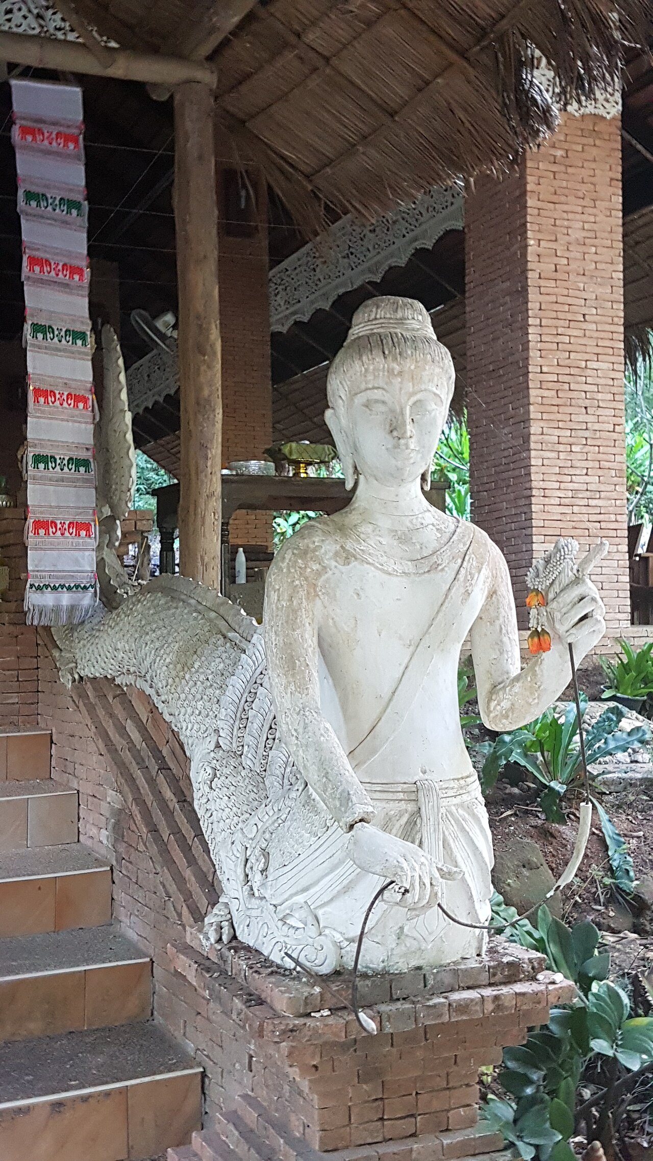 Naga pendant — Mythological creatures at Wat Sakithaka