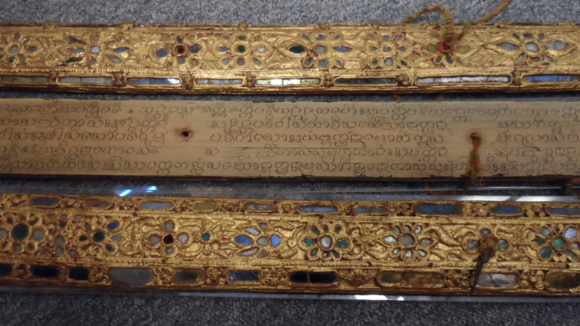 Lao yantra in Tham script — Nineteenth century Kammavāca palm leaf manuscript from Laos written in Tham Script. The wooden covers are decorated with