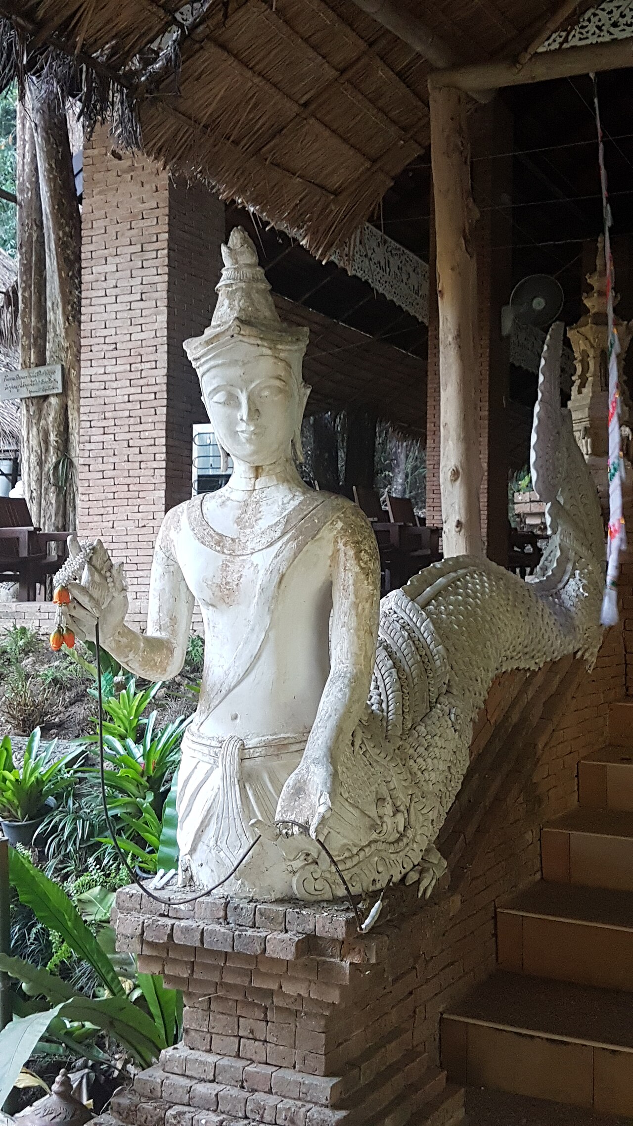 Naga pendant — Mythological creatures at Wat Sakithaka