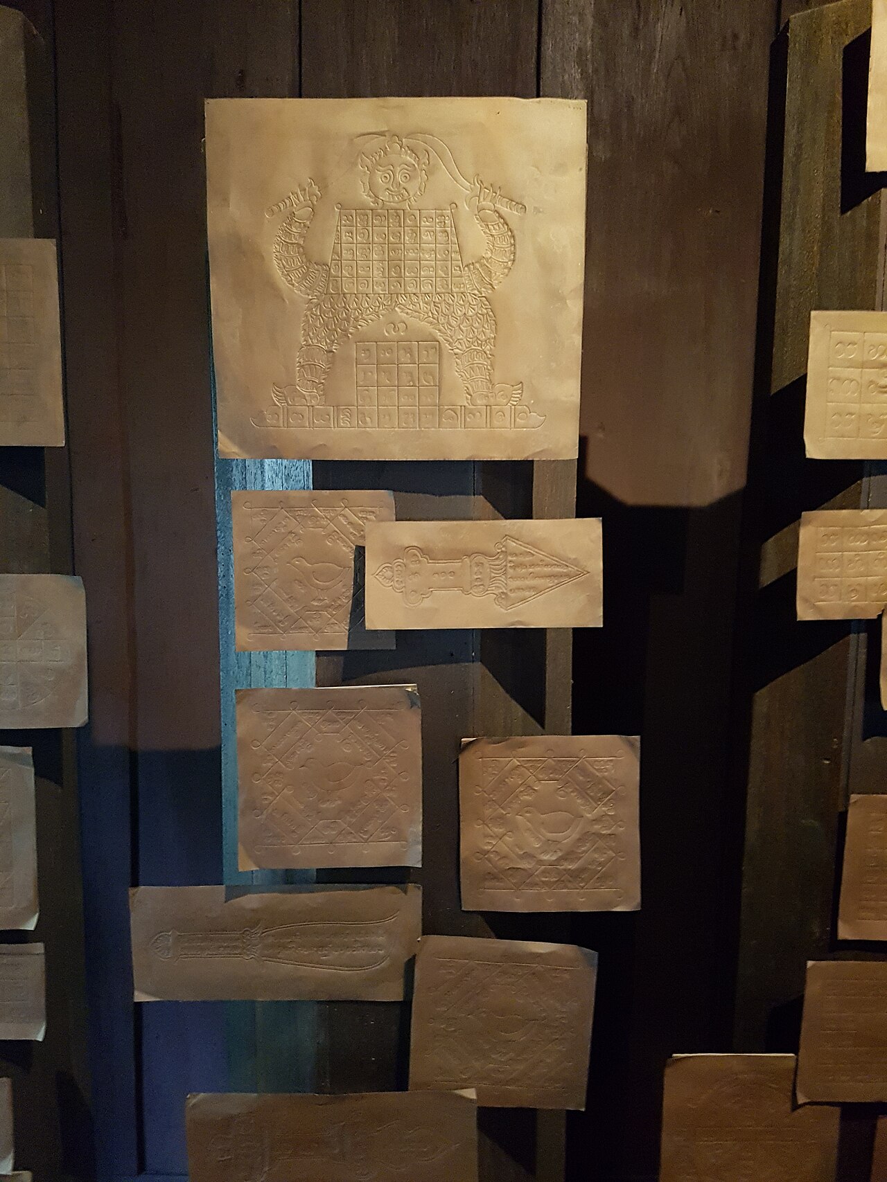 Takrut (inscribed scroll-tube) — * Place: Siam Society Headquarters, Bangkok, Thailand.
Items: Yantra mystic sheets.