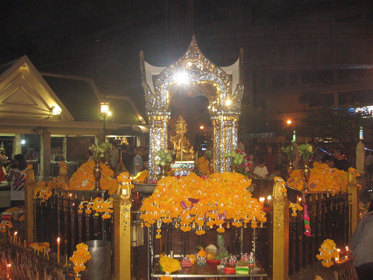 Four-faced Brahma pendant — Erawan Shrine in Bangkok, Thailand. At night of Oct 6th, 2017.