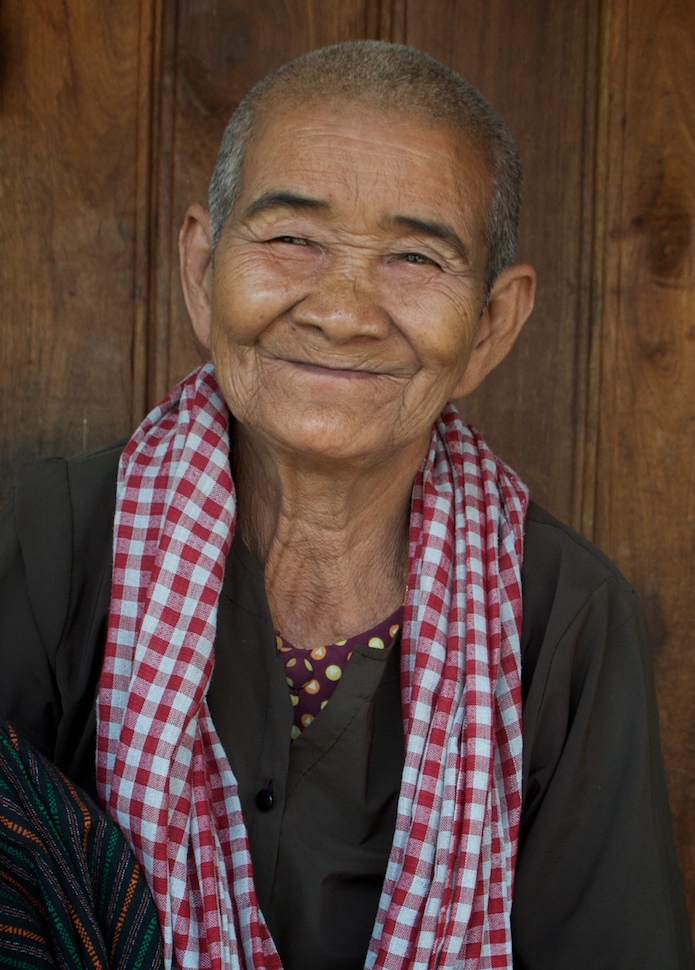 Khmer yantra cloth — Cambodian woman with a krama, a traditional Cambodian garment, around her neck