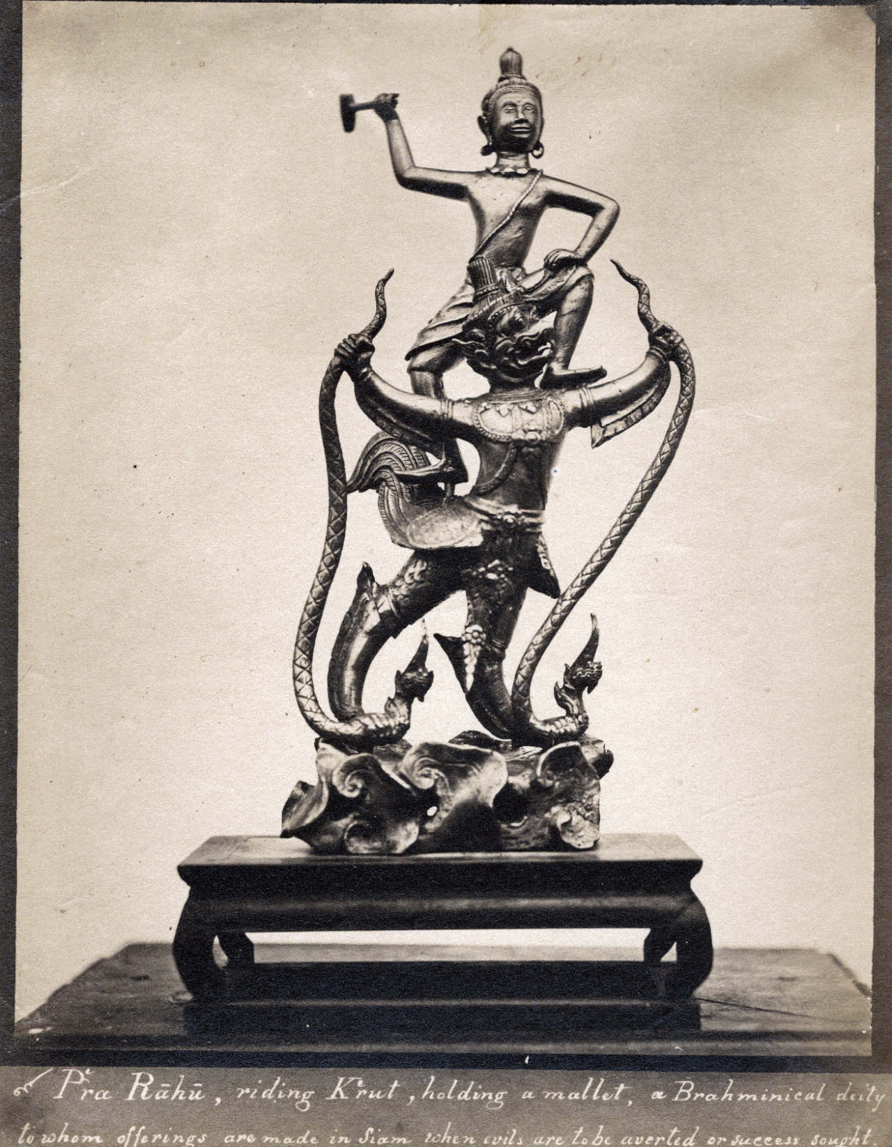 Phra Rahu (the eclipse-swallower) — Phra Rahu riding Krat (garuda) holding a mallet a Brahminical diety to whom offerings are made in Siam