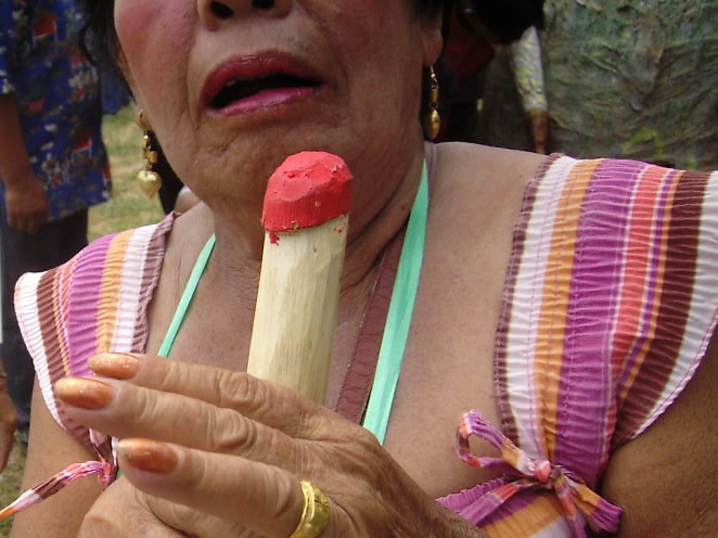 Palad khik (phallic waist charm) — Rocket Festival microphone photographed in his village by Pawyi Lee