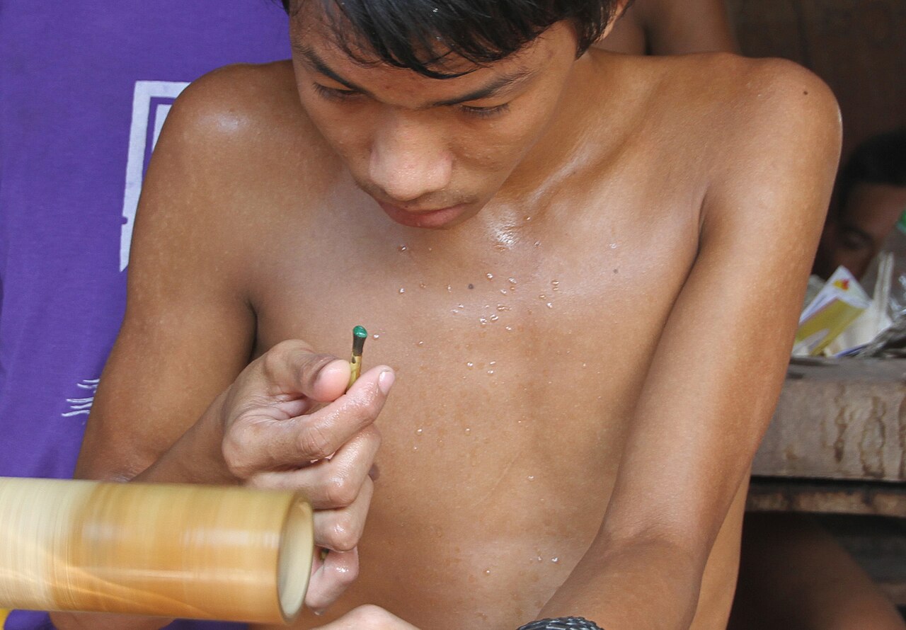 Burmese jadeite Buddha pendant — ade market in Mandalay in Myanmar.