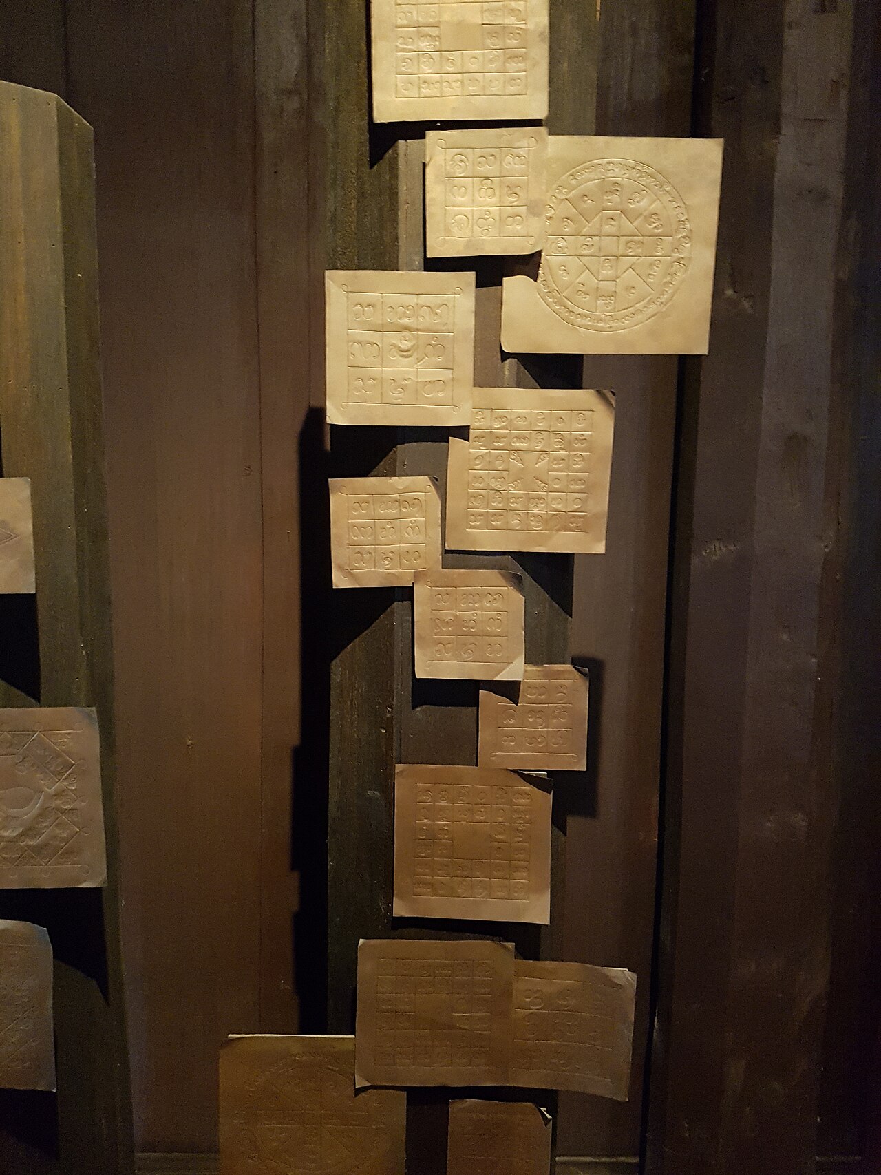 Takrut (inscribed scroll-tube) — * Place: Siam Society Headquarters, Bangkok, Thailand.
Items: Yantra mystic sheets.