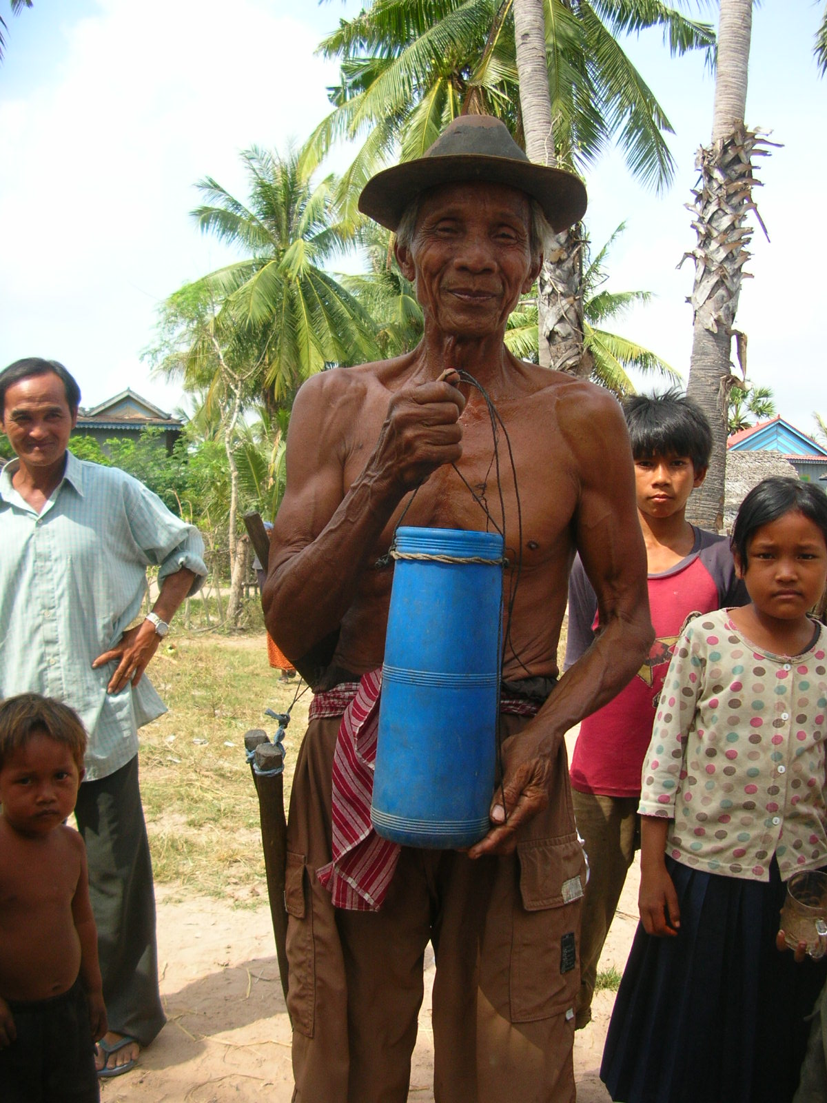 Khmer yantra cloth — Many villagers are adept at shimmying up palm trees; they drink the juice and make palm sugar & wine. Takeo Province