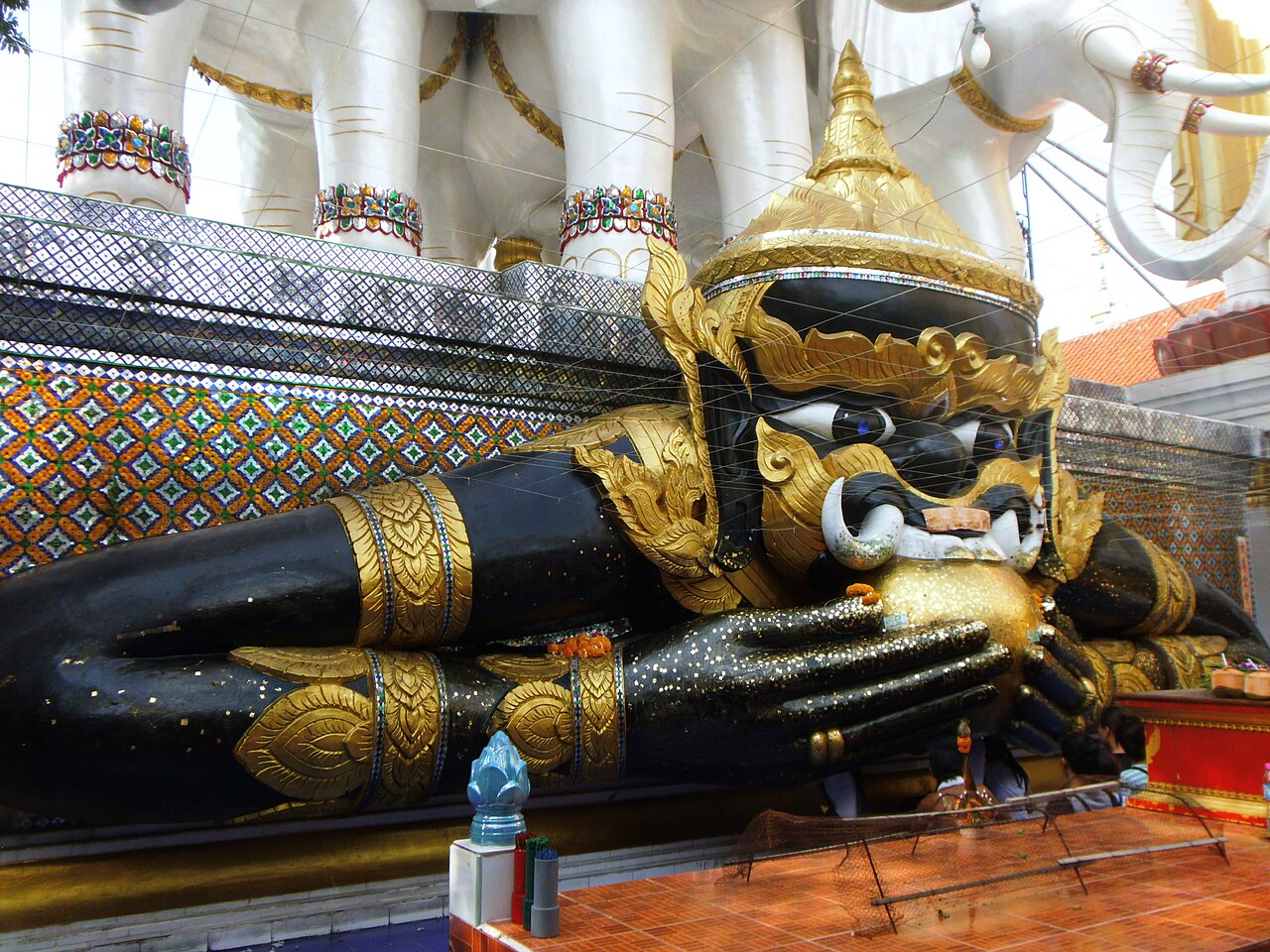 Phra Rahu (the eclipse-swallower) — This is a photo of a monument in Thailand identified by the ID