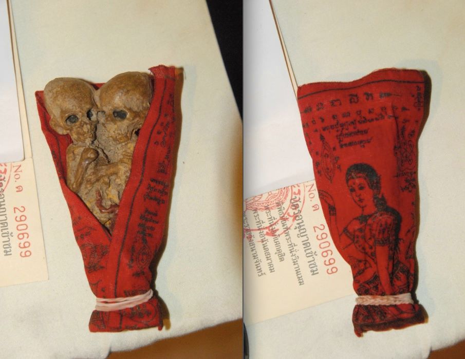 Kuman Thong (raised child-spirit) — A reproduction Kuman Thong sold as a collection for Thai Belief collectors, at the Buddhist temple at Ayutthaya, Thailan