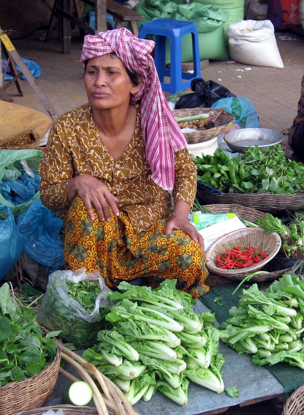 Khmer yantra cloth — Market woman with Krama in Kampong Thom, Cambodia