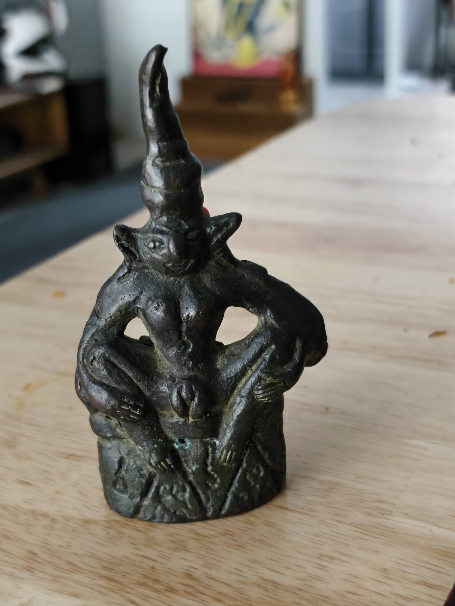 Ngang, bronze, red eyes, photograph 2