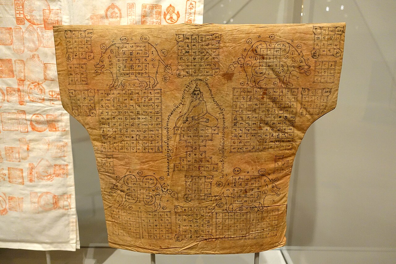 In (Burmese cabalistic square) — Exhibit in the Textile Museum, George Washington University, Washington, DC, USA. Photography was permitted in the museu