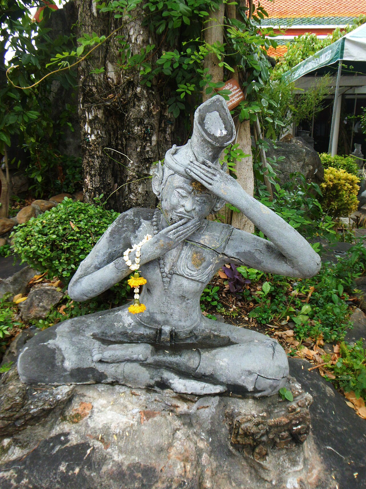 Phra Lersi figure (the hermit-teacher) — This is a photo of a monument in Thailand identified by the ID