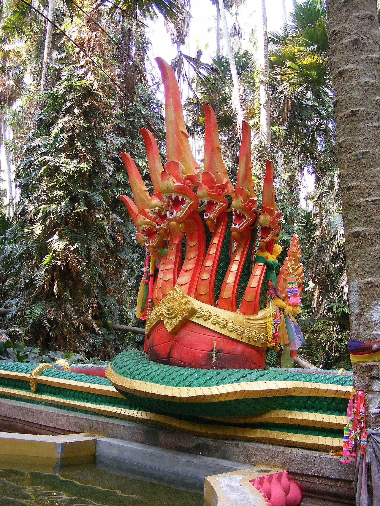 Naga pendant — Nāga statue at Wat Kham Chanot (Wat Kumchanot), Udon Thani province, Thailand.