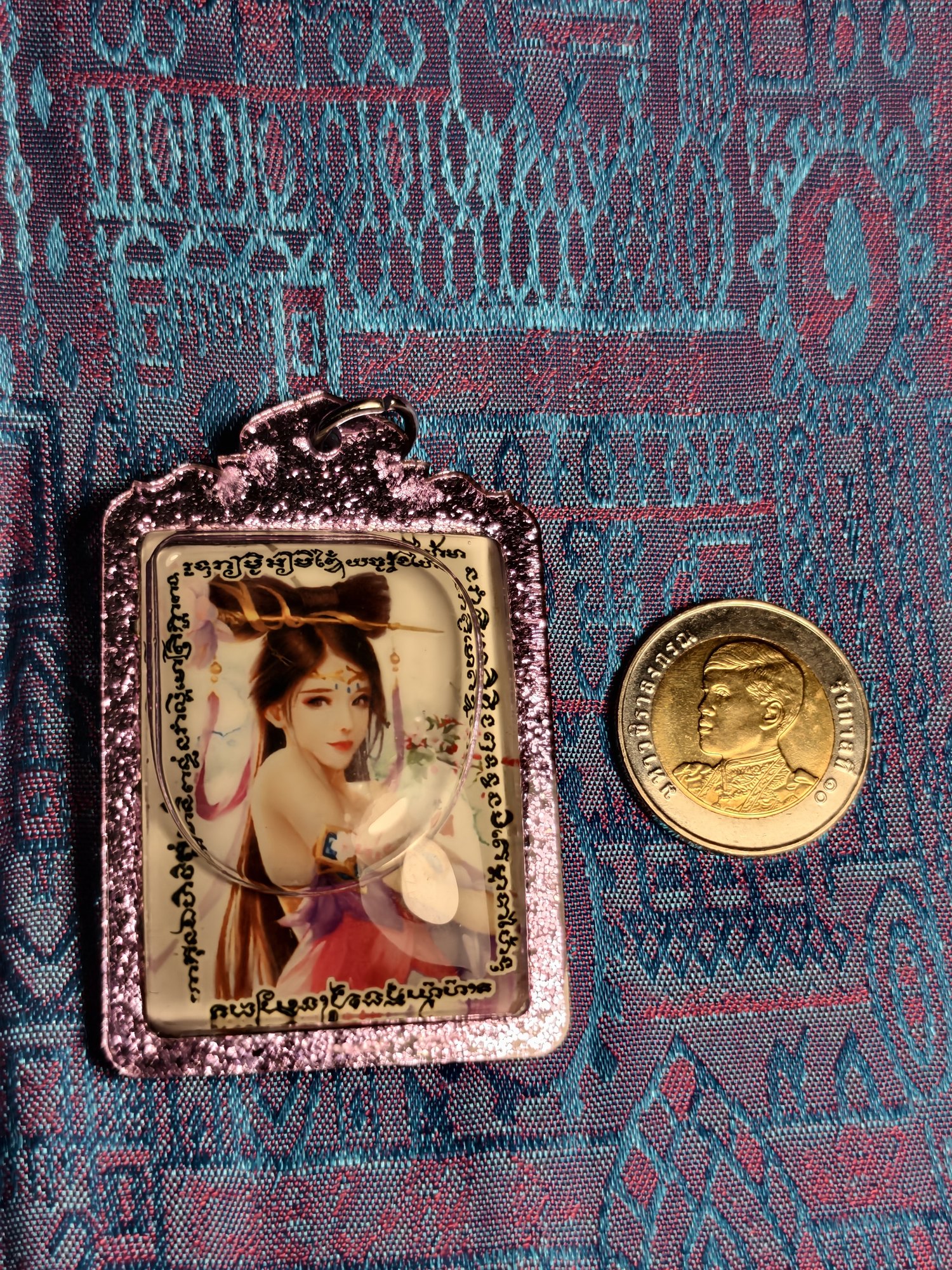 Nine-tailed fox, a maha saneh (attraction) amulet from Korat, oil-filled, photograph 1