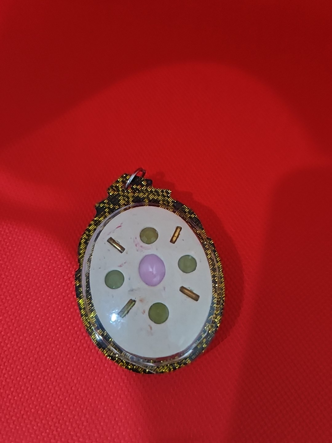 Round case set with stones, photograph 1