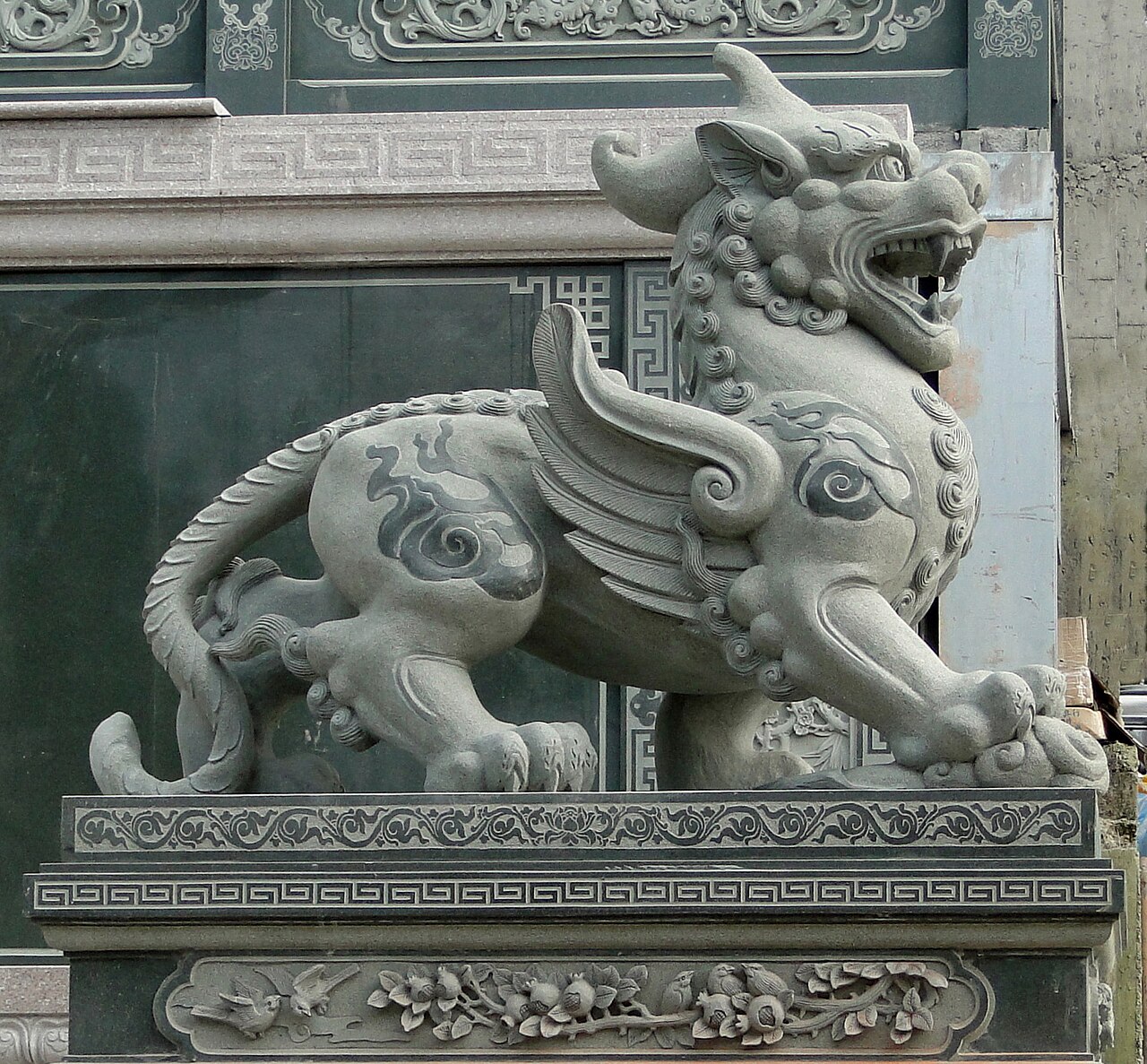 Pixiu (wealth beast) pendant — Sculpture of Pixiu, one of the nine dragons sons in Wen Wu Temple at Sun Moon Lake, Nantou county, Taiwan