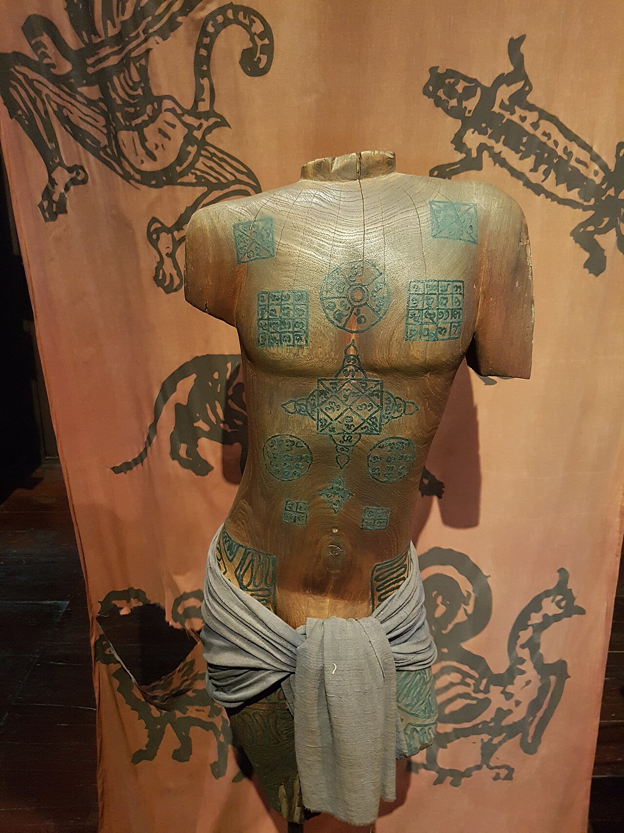 In (Burmese cabalistic square) — * Place: Siam Society Headquarters, Bangkok, Thailand.
Items: Yantra tattooing model.