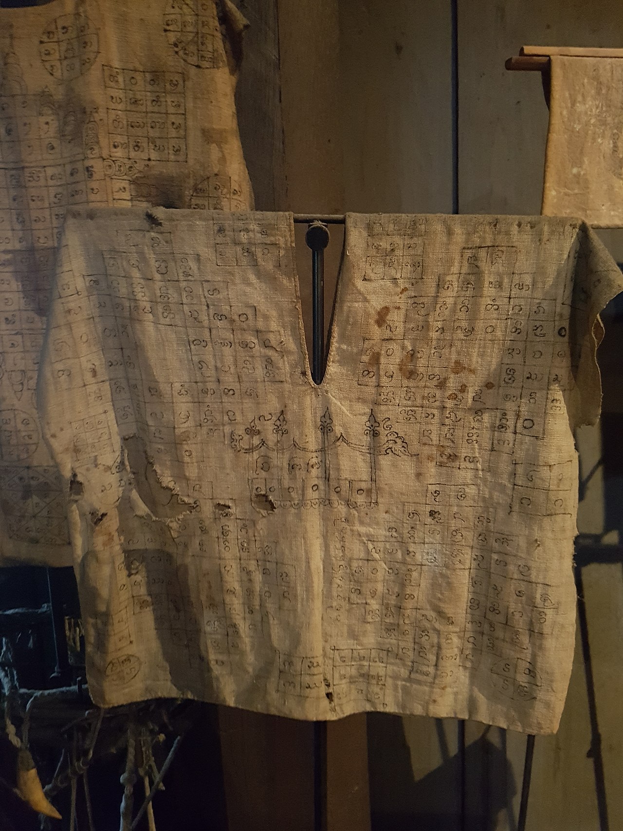 Suea yan (yantra shirt) — * Place: Siam Society Headquarters, Bangkok, Thailand.
Items: Yantra mystic sheets.