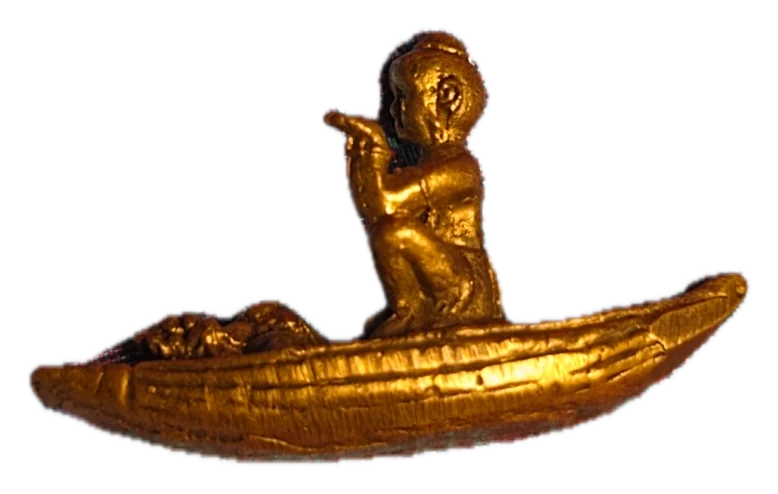 เรือทอง เด็กนั่ง · Gilt boat with a seated child