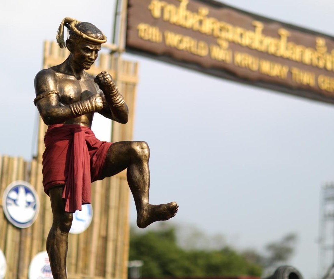 Prachiat (yantra head-cloth / armband) — A replica statue of Nai Khanom Tom, a traditional Thai Muay Thai boxer from Ayutthaya, displayed at the Nai Khanom Tom C