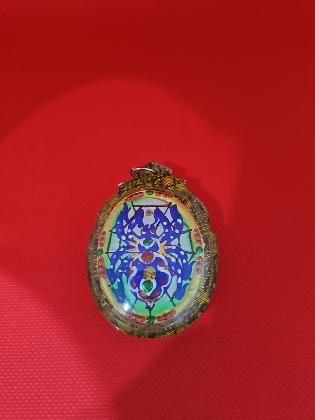 Spider amulet for drawing wealth, oil-filled, from Korat, photograph 1
