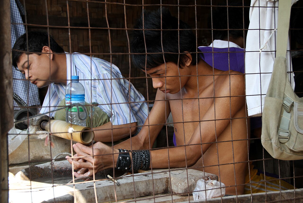 Burmese jadeite Buddha pendant — ade market in Mandalay in Myanmar.
