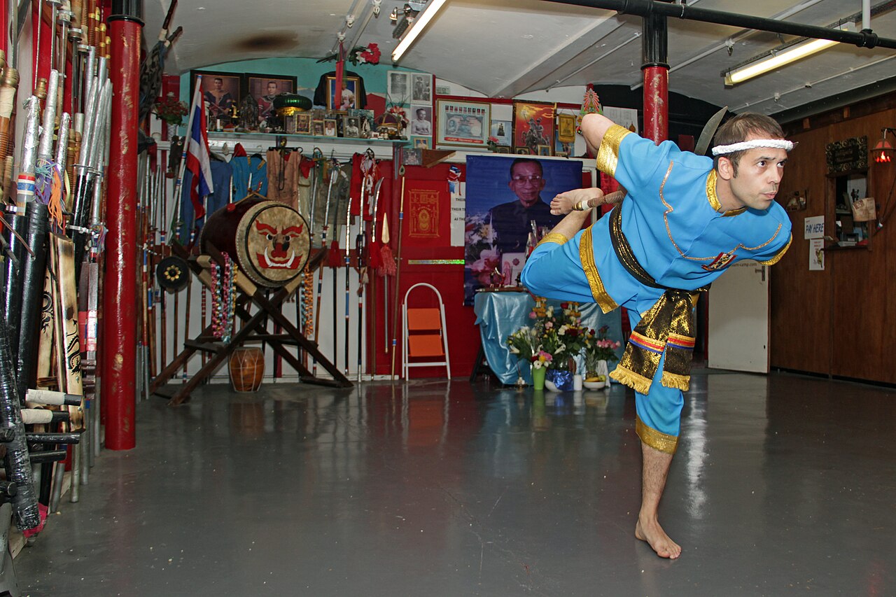 Prachiat (yantra head-cloth / armband) — The Ram Daab sword dance in Krabi Krabong.