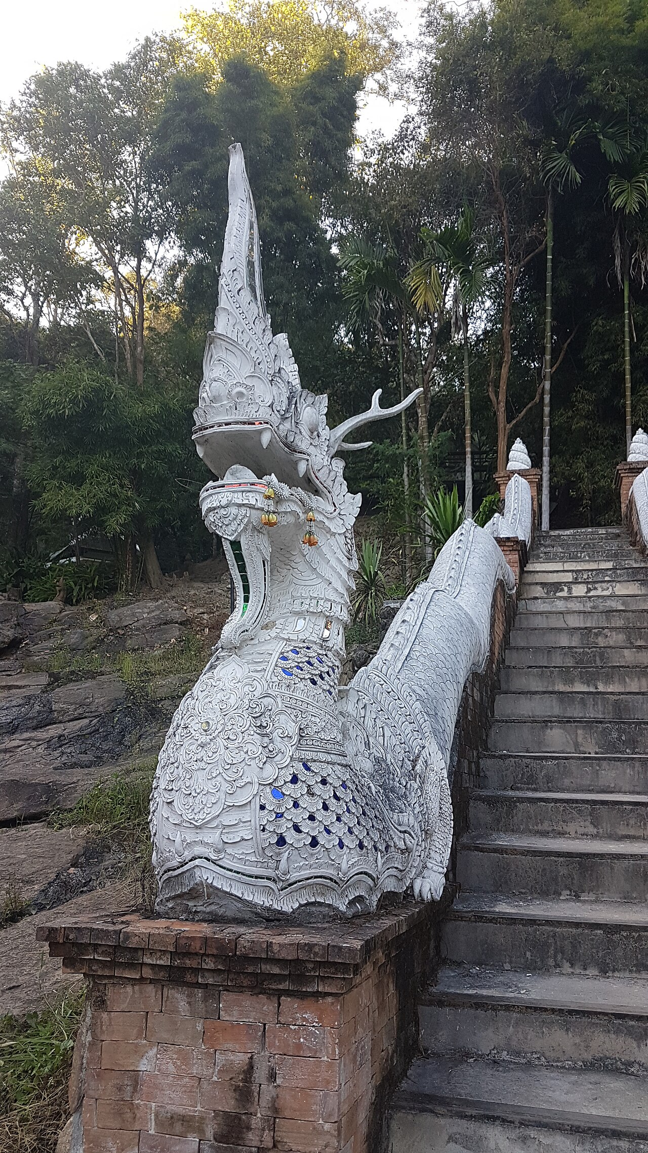 Naga pendant — Mythological creatures at Wat Sakithaka